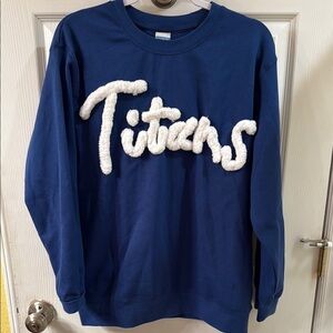 Blue Sweatshirt with White Text TITANS